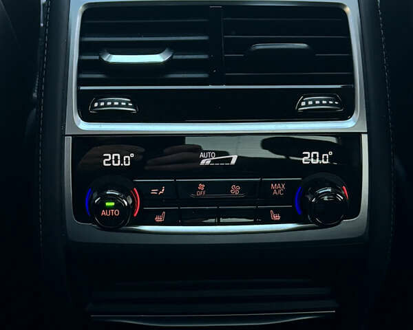 Черный БМВ 7 Серия, объемом двигателя 2.99 л и пробегом 99 тыс. км за 70777 $, фото 22 на Automoto.ua