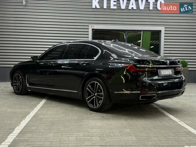 Черный БМВ 7 Серия, объемом двигателя 4.4 л и пробегом 115 тыс. км за 46000 $, фото 5 на Automoto.ua