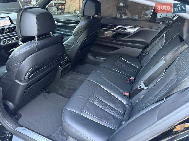 Черный БМВ 7 Серия, объемом двигателя 4.39 л и пробегом 122 тыс. км за 56999 $, фото 2 на Automoto.ua