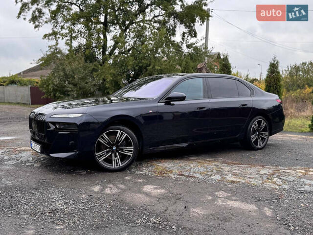Черный БМВ 7 Серия, объемом двигателя 2.99 л и пробегом 42 тыс. км за 125000 $, фото 1 на Automoto.ua