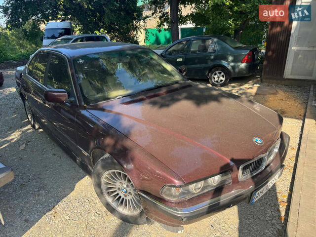Красный БМВ 7 Серия, объемом двигателя 2.99 л и пробегом 777 тыс. км за 2999 $, фото 3 на Automoto.ua