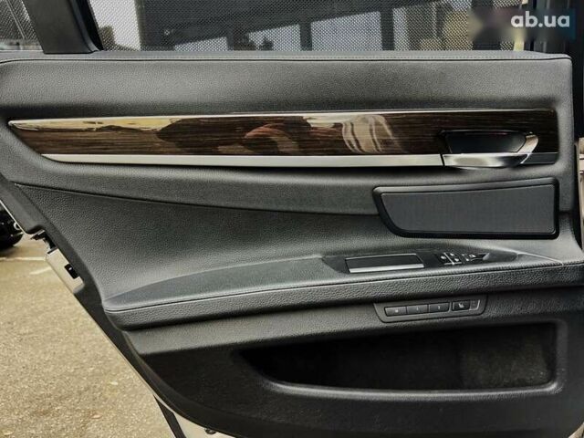 БМВ 7 Серия, объемом двигателя 4.4 л и пробегом 100 тыс. км за 11300 $, фото 16 на Automoto.ua