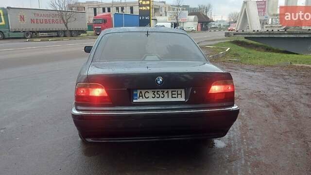 Серый БМВ 7 Серия, объемом двигателя 2.5 л и пробегом 426 тыс. км за 4800 $, фото 2 на Automoto.ua