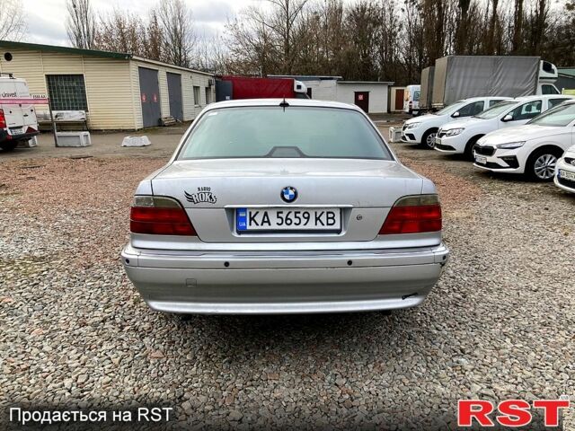 Серый БМВ 7 Серия, объемом двигателя 3.5 л и пробегом 287 тыс. км за 3000 $, фото 2 на Automoto.ua