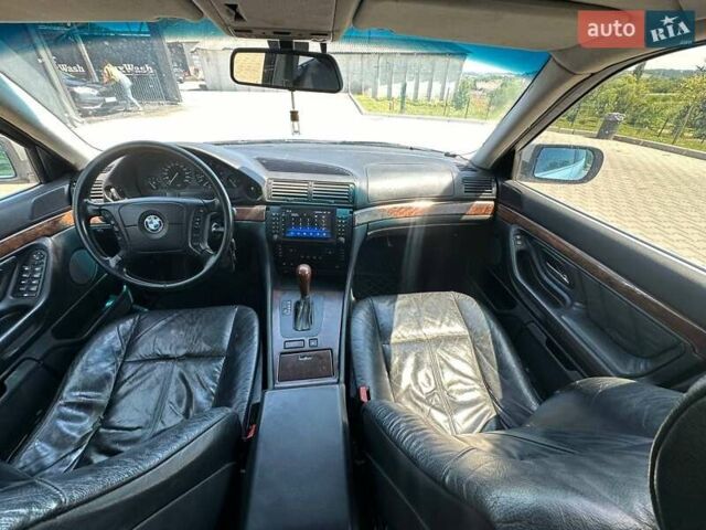 Серый БМВ 7 Серия, объемом двигателя 2.79 л и пробегом 350 тыс. км за 2999 $, фото 26 на Automoto.ua