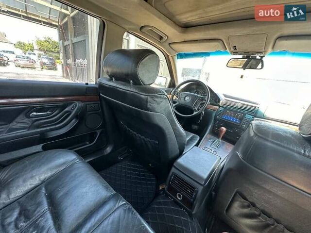 Серый БМВ 7 Серия, объемом двигателя 2.79 л и пробегом 350 тыс. км за 2999 $, фото 24 на Automoto.ua