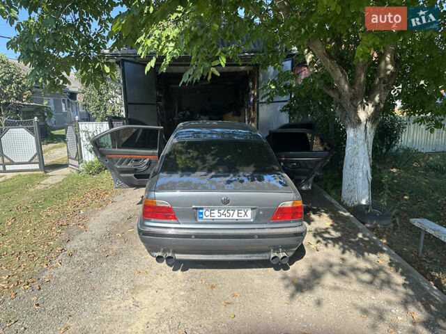 Серый БМВ 7 Серия, объемом двигателя 3 л и пробегом 495 тыс. км за 6500 $, фото 7 на Automoto.ua