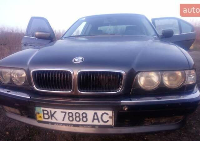 Серый БМВ 7 Серия, объемом двигателя 3 л и пробегом 250 тыс. км за 5500 $, фото 5 на Automoto.ua