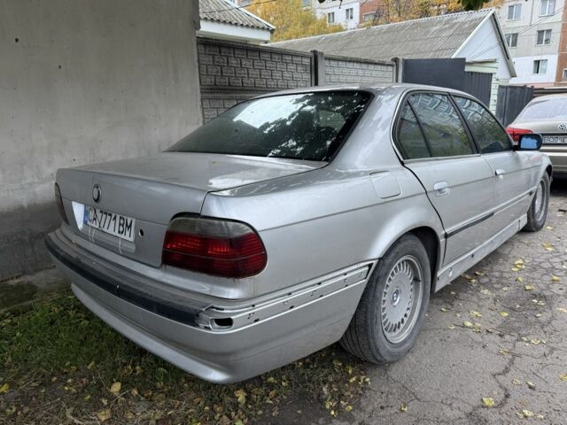 Серый БМВ 7 Серия, объемом двигателя 3.9 л и пробегом 500 тыс. км за 3000 $, фото 2 на Automoto.ua