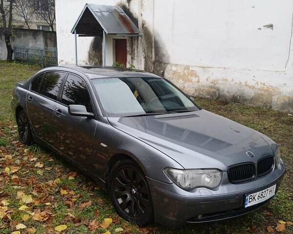 Серый БМВ 7 Серия, объемом двигателя 4.4 л и пробегом 300 тыс. км за 6000 $, фото 5 на Automoto.ua
