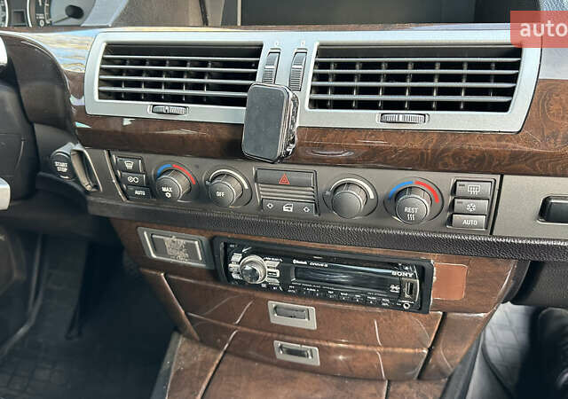 Серый БМВ 7 Серия, объемом двигателя 3.5 л и пробегом 315 тыс. км за 5500 $, фото 24 на Automoto.ua