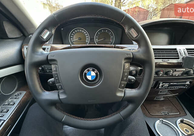 Серый БМВ 7 Серия, объемом двигателя 3.5 л и пробегом 315 тыс. км за 5500 $, фото 25 на Automoto.ua