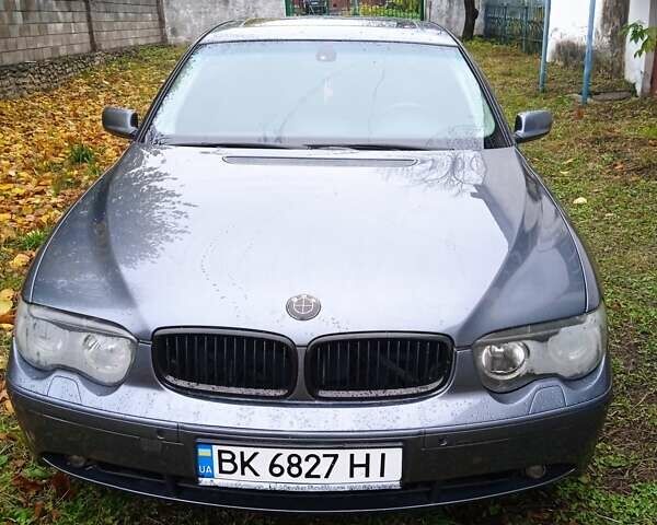 Серый БМВ 7 Серия, объемом двигателя 4.4 л и пробегом 300 тыс. км за 6000 $, фото 2 на Automoto.ua