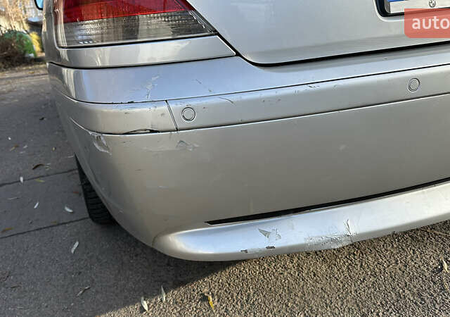 Серый БМВ 7 Серия, объемом двигателя 3.5 л и пробегом 315 тыс. км за 5500 $, фото 9 на Automoto.ua