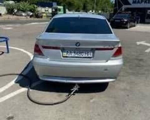 Серый БМВ 7 Серия, объемом двигателя 4.4 л и пробегом 435 тыс. км за 5500 $, фото 1 на Automoto.ua