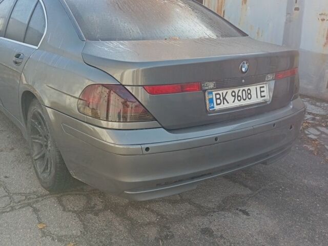 Серый БМВ 7 Серия, объемом двигателя 3 л и пробегом 320 тыс. км за 6200 $, фото 2 на Automoto.ua