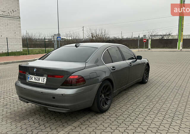 Серый БМВ 7 Серия, объемом двигателя 2.99 л и пробегом 311 тыс. км за 5500 $, фото 14 на Automoto.ua