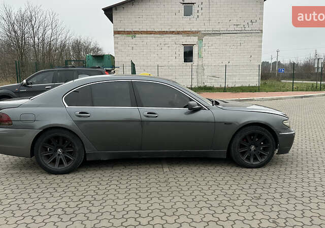 Серый БМВ 7 Серия, объемом двигателя 2.99 л и пробегом 311 тыс. км за 5500 $, фото 4 на Automoto.ua