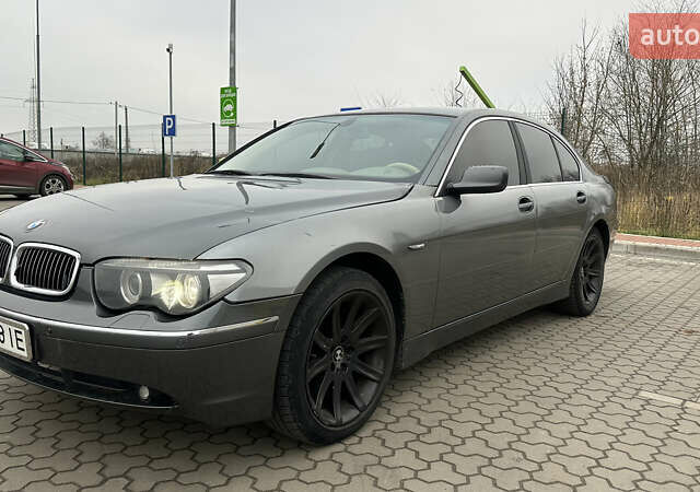 Серый БМВ 7 Серия, объемом двигателя 2.99 л и пробегом 311 тыс. км за 5500 $, фото 1 на Automoto.ua