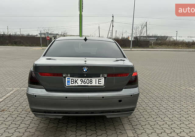 Серый БМВ 7 Серия, объемом двигателя 2.99 л и пробегом 311 тыс. км за 5500 $, фото 5 на Automoto.ua