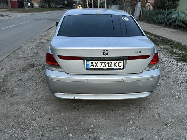 Серый БМВ 7 Серия, объемом двигателя 4.4 л и пробегом 330 тыс. км за 8500 $, фото 5 на Automoto.ua