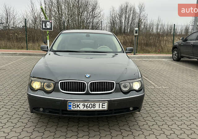 Серый БМВ 7 Серия, объемом двигателя 2.99 л и пробегом 311 тыс. км за 5500 $, фото 2 на Automoto.ua