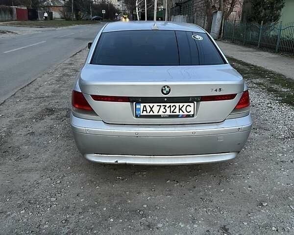 Серый БМВ 7 Серия, объемом двигателя 4.4 л и пробегом 330 тыс. км за 8500 $, фото 4 на Automoto.ua