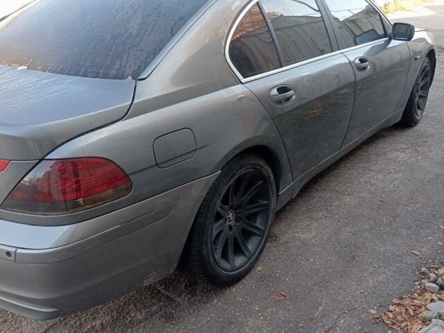 Серый БМВ 7 Серия, объемом двигателя 3 л и пробегом 320 тыс. км за 6200 $, фото 3 на Automoto.ua