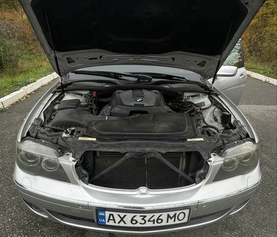 Серый БМВ 7 Серия, объемом двигателя 4 л и пробегом 327 тыс. км за 8300 $, фото 6 на Automoto.ua