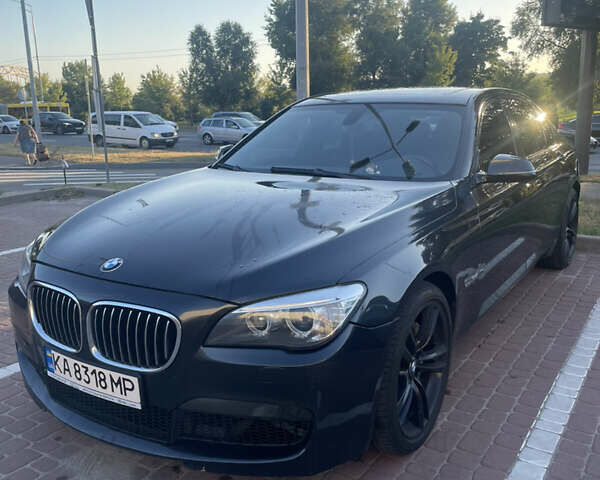 Серый БМВ 7 Серия, объемом двигателя 3 л и пробегом 216 тыс. км за 14200 $, фото 1 на Automoto.ua