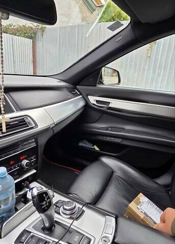 Серый БМВ 7 Серия, объемом двигателя 2.99 л и пробегом 280 тыс. км за 25000 $, фото 2 на Automoto.ua