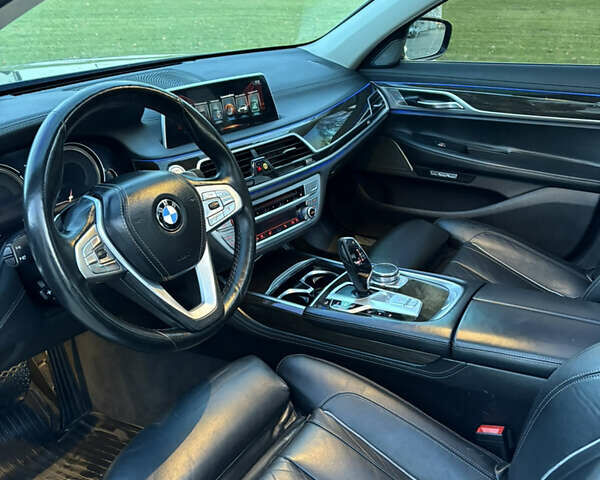 Серый БМВ 7 Серия, объемом двигателя 4.39 л и пробегом 140 тыс. км за 27500 $, фото 30 на Automoto.ua