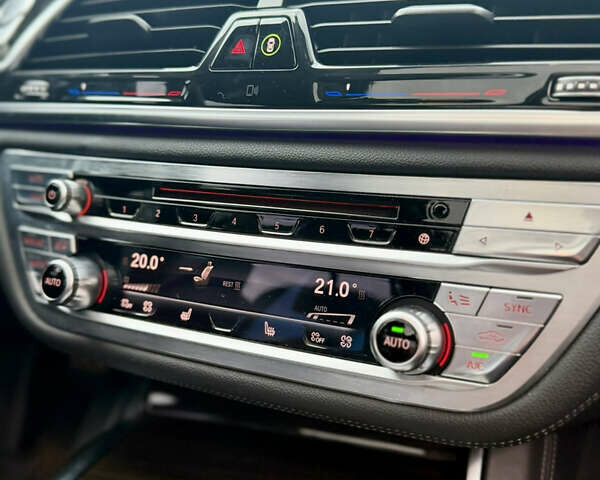 Серый БМВ 7 Серия, объемом двигателя 4.39 л и пробегом 141 тыс. км за 27777 $, фото 23 на Automoto.ua