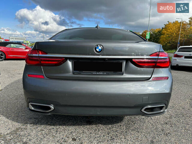 Серый БМВ 7 Серия, объемом двигателя 3 л и пробегом 118 тыс. км за 42000 $, фото 4 на Automoto.ua