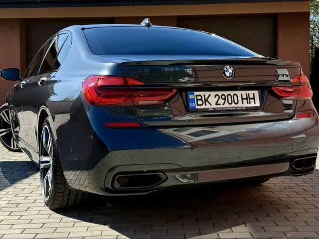 Серый БМВ 7 Серия, объемом двигателя 3 л и пробегом 132 тыс. км за 55000 $, фото 3 на Automoto.ua