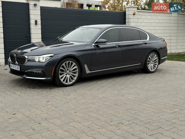 Серый БМВ 7 Серия, объемом двигателя 3 л и пробегом 89 тыс. км за 31400 $, фото 1 на Automoto.ua