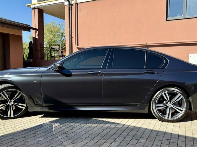 Серый БМВ 7 Серия, объемом двигателя 3 л и пробегом 132 тыс. км за 55000 $, фото 4 на Automoto.ua