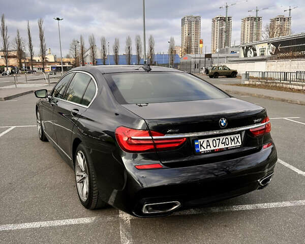 Серый БМВ 7 Серия, объемом двигателя 3 л и пробегом 104 тыс. км за 40000 $, фото 3 на Automoto.ua