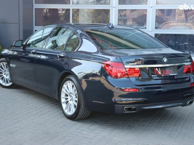 Синий БМВ 7 Серия, объемом двигателя 4.4 л и пробегом 115 тыс. км за 28900 $, фото 2 на Automoto.ua