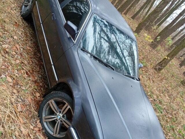 Синий БМВ 7 Серия, объемом двигателя 3.4 л и пробегом 150 тыс. км за 2750 $, фото 6 на Automoto.ua