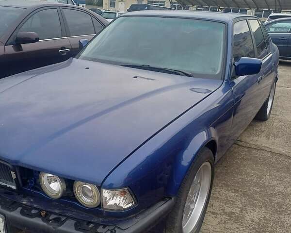 Синий БМВ 7 Серия, объемом двигателя 3.5 л и пробегом 240 тыс. км за 2800 $, фото 1 на Automoto.ua