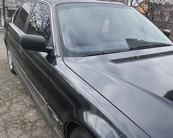 Синий БМВ 7 Серия, объемом двигателя 3 л и пробегом 400 тыс. км за 3200 $, фото 5 на Automoto.ua