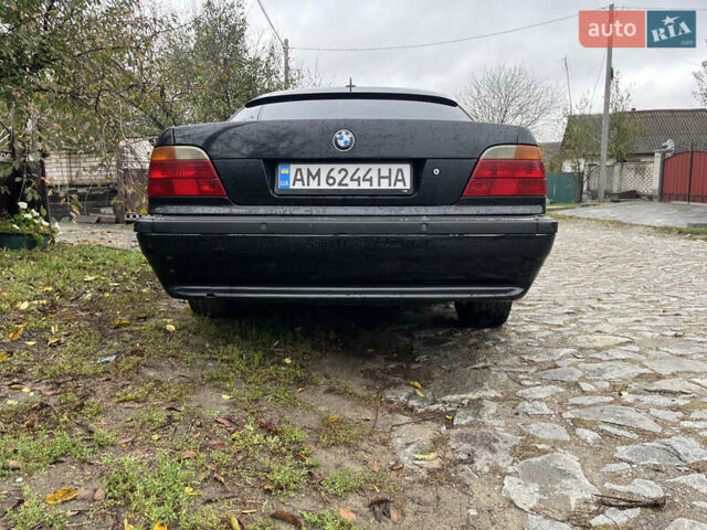 Синий БМВ 7 Серия, объемом двигателя 3 л и пробегом 400 тыс. км за 3200 $, фото 1 на Automoto.ua