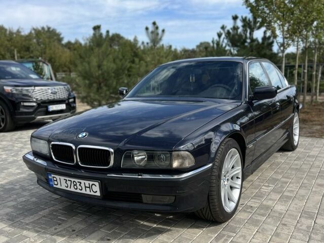Синий БМВ 7 Серия, объемом двигателя 3 л и пробегом 100 тыс. км за 3500 $, фото 1 на Automoto.ua