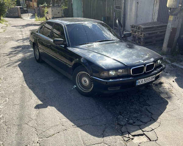 Синій БМВ 7 Серія, об'ємом двигуна 4 л та пробігом 450 тис. км за 4200 $, фото 11 на Automoto.ua