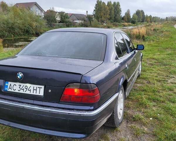 Синий БМВ 7 Серия, объемом двигателя 3 л и пробегом 350 тыс. км за 4300 $, фото 6 на Automoto.ua