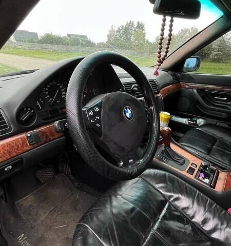 Синий БМВ 7 Серия, объемом двигателя 3 л и пробегом 350 тыс. км за 4300 $, фото 4 на Automoto.ua