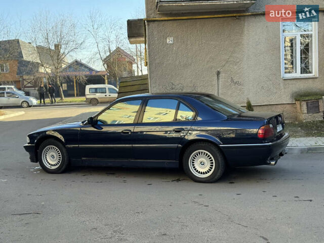 Синий БМВ 7 Серия, объемом двигателя 3.5 л и пробегом 394 тыс. км за 5299 $, фото 28 на Automoto.ua