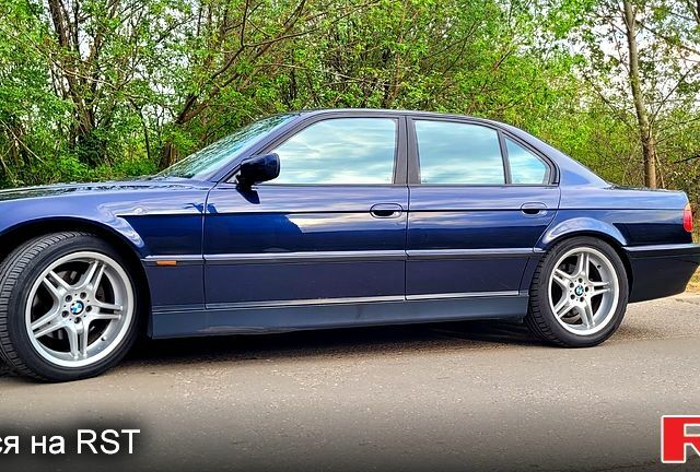 Синий БМВ 7 Серия, объемом двигателя 4.4 л и пробегом 310 тыс. км за 8700 $, фото 5 на Automoto.ua