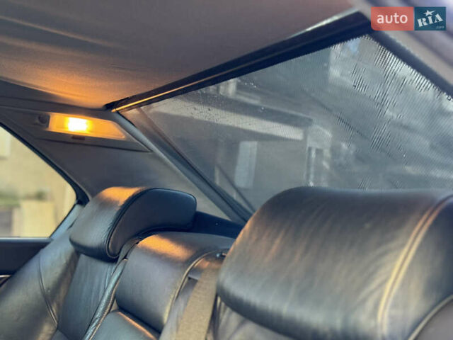 Синий БМВ 7 Серия, объемом двигателя 3.5 л и пробегом 394 тыс. км за 5299 $, фото 1 на Automoto.ua